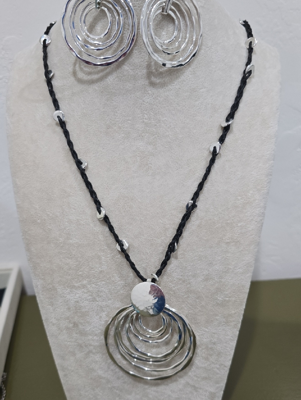 Rober Lee Morris Silver Multi-Ring Pendant Necklace with Black Braided Cord